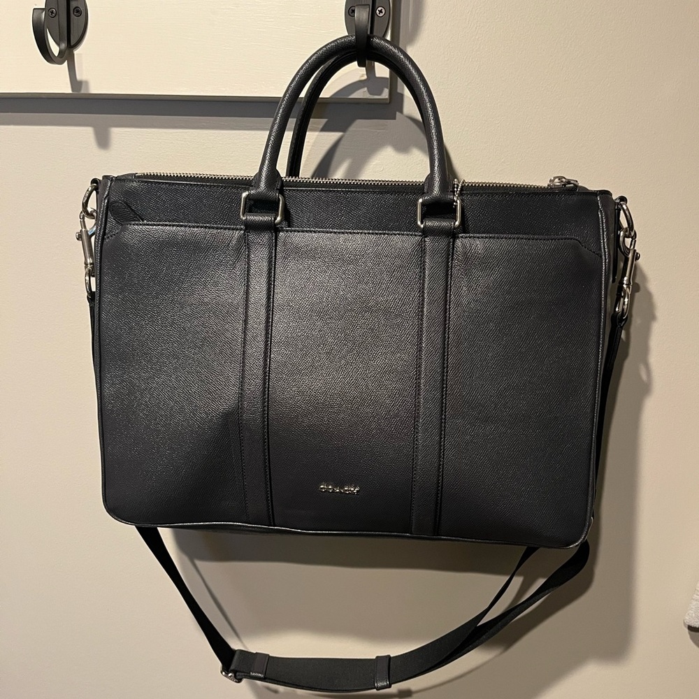 Leather navy messenger bag.